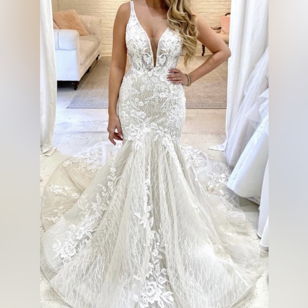 Gorgeous Martina Liana Wedding Gown, originally $3500.
